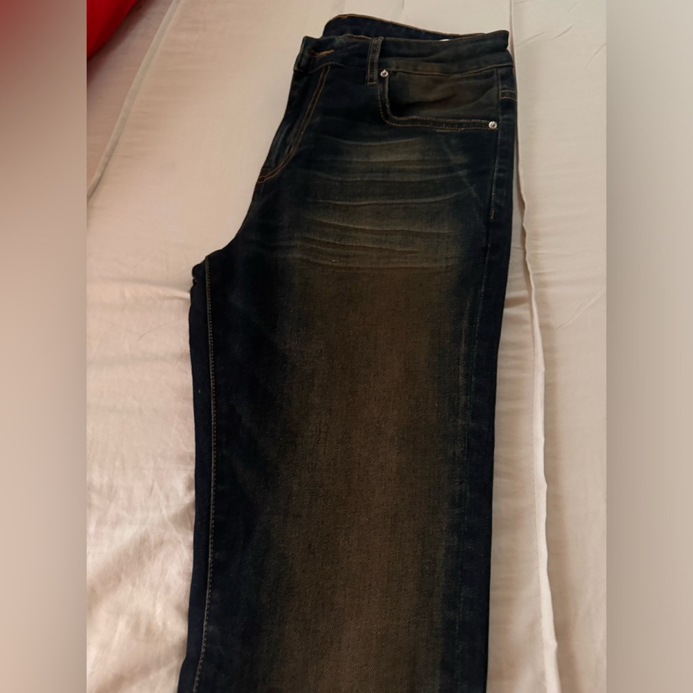 Embellish Men’s Dark wash bootcut jeans.